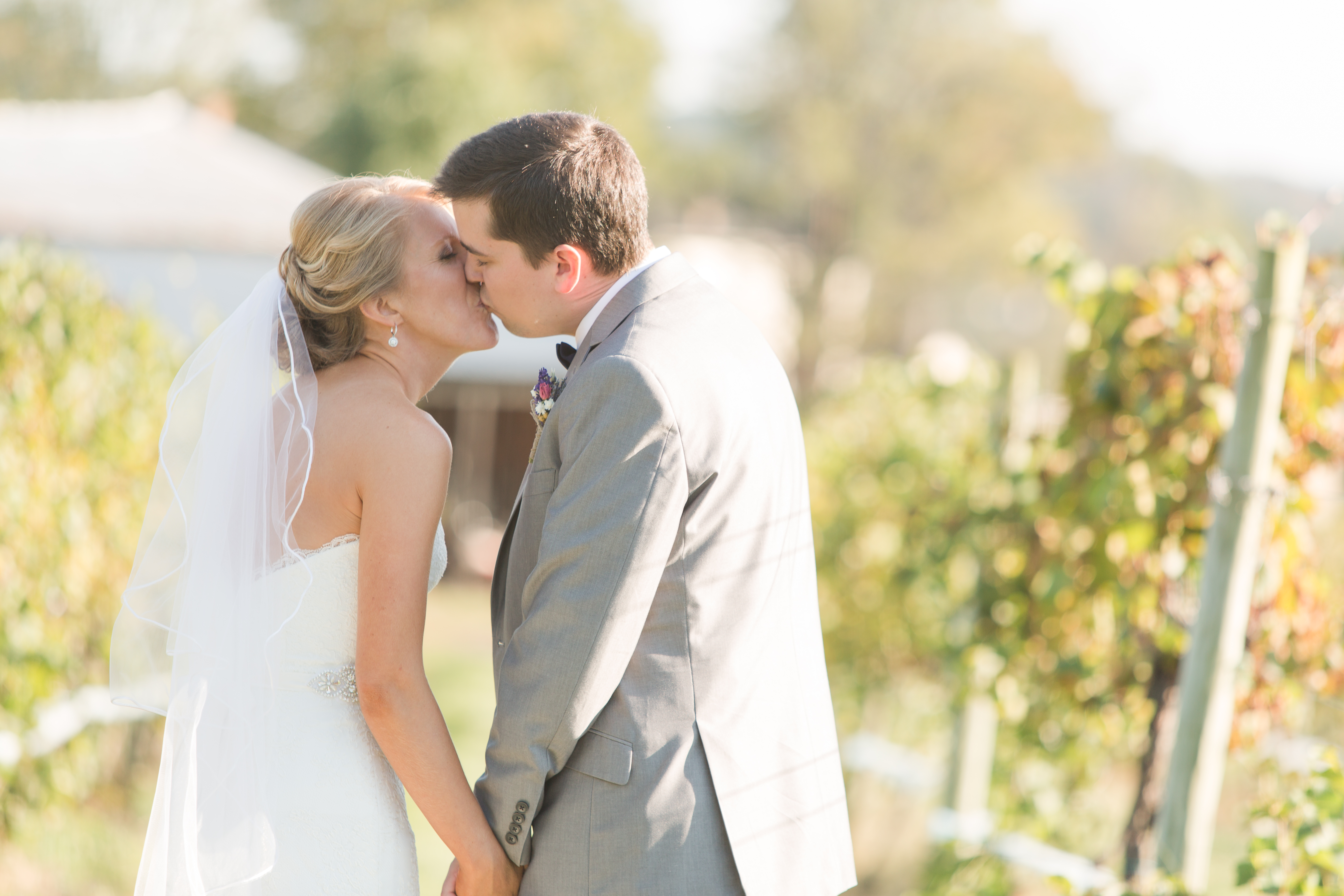 Couple kisses after their first look
